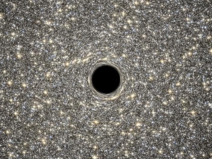 ілюстрація надмасивної чорної діри масою в 21 мільйон сонць